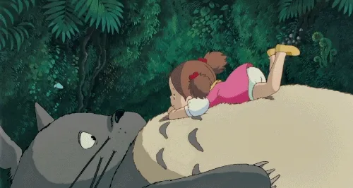Mei playfully inspecting Totoro from My Neighbor Totoro